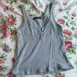 strip button tank
